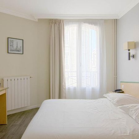 Hotel Briand Devient Hotel Ipl Левалуа-Пере Экстерьер фото